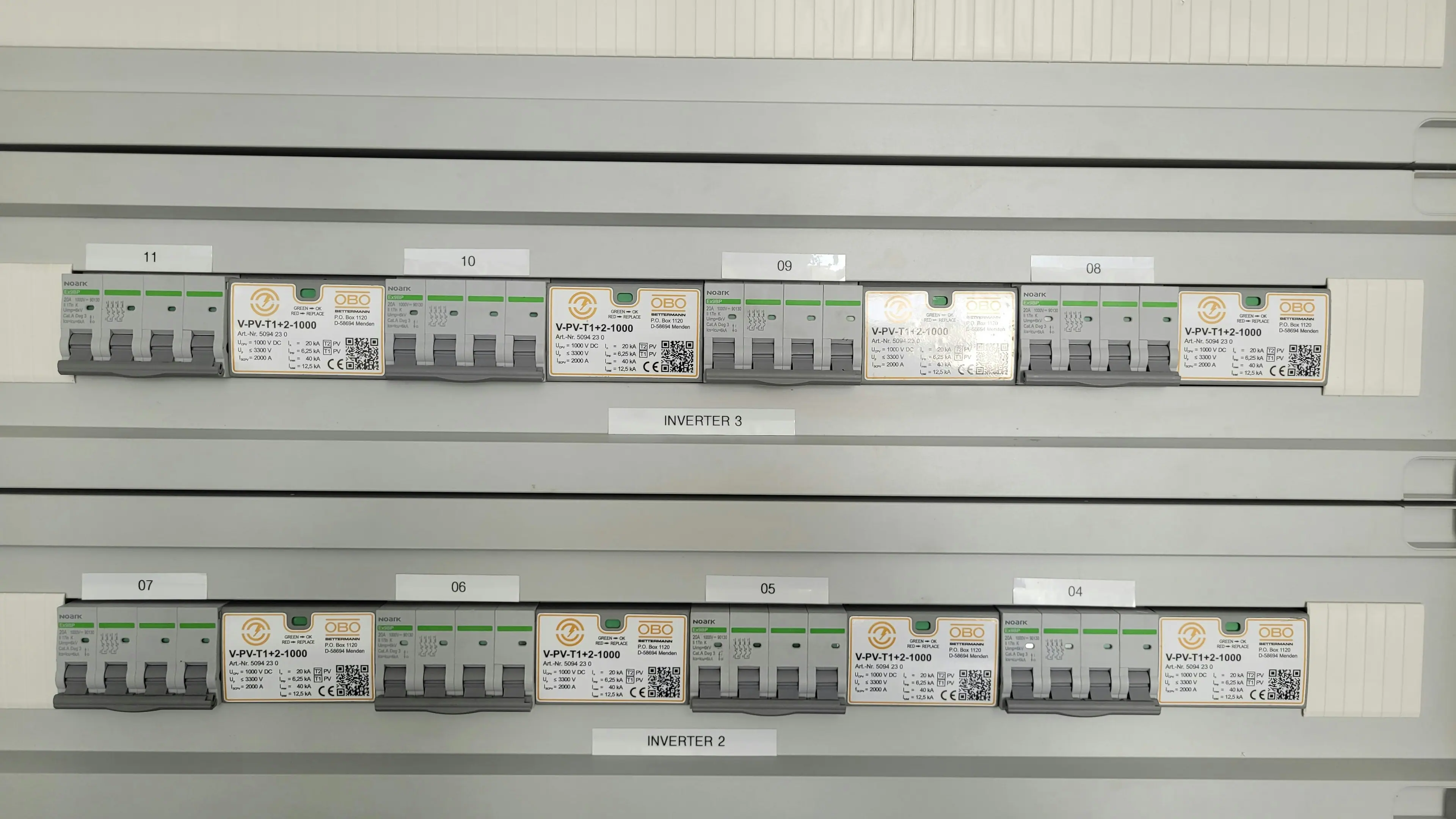 Rows of DC and AC circuit breakers in a solar distribution board
